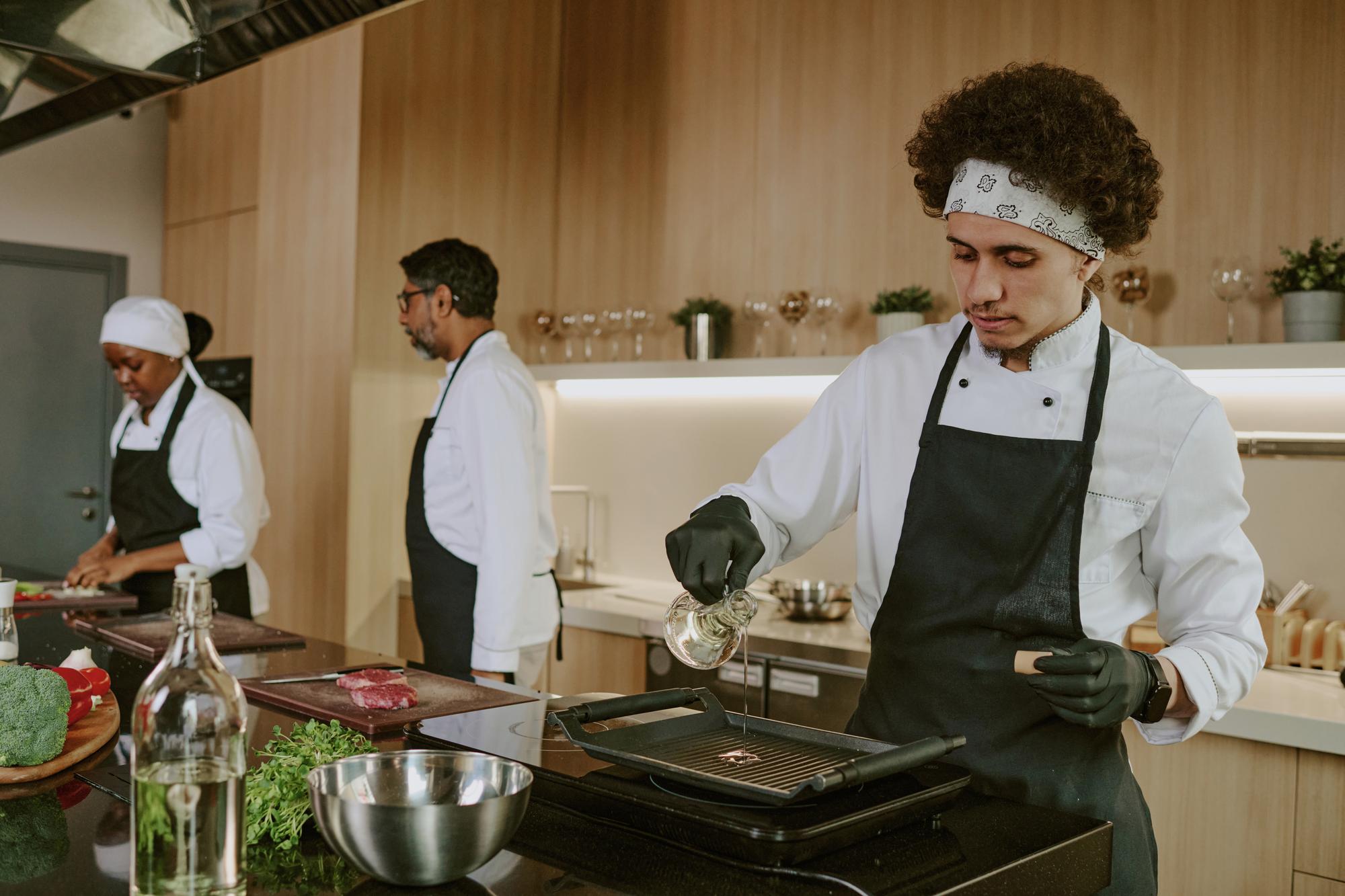 Small commercial kitchen with chef team
